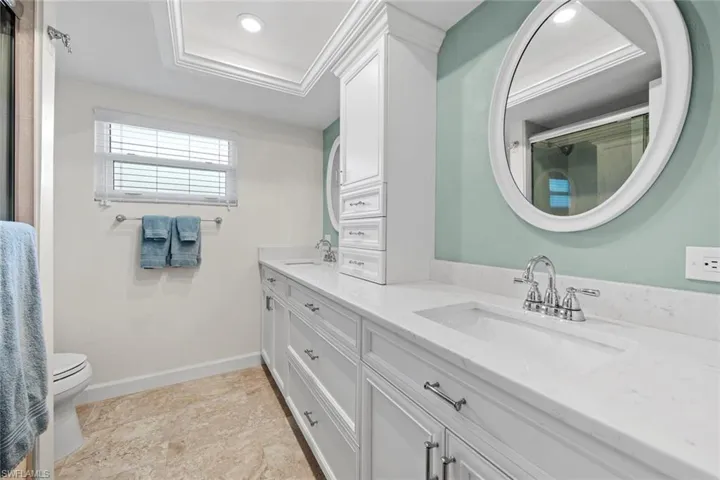 Renovated Guest Bathroom with dual sinks.