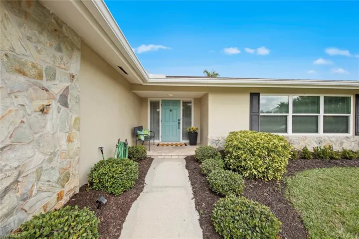 Lovely curb appeal as you walk up to the front door.