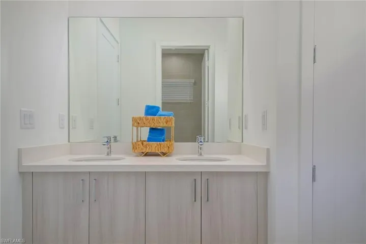 Bathroom featuring double vanity