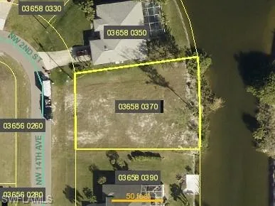 Aerial map of property and surrounding area with property boundaries highlighted