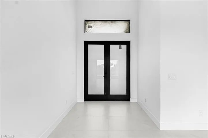 Foyer with baseboards