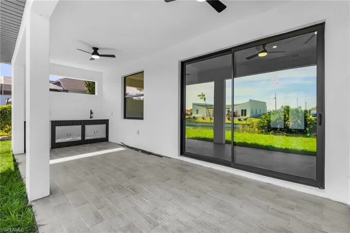 View of patio / terrace with a ceiling fan