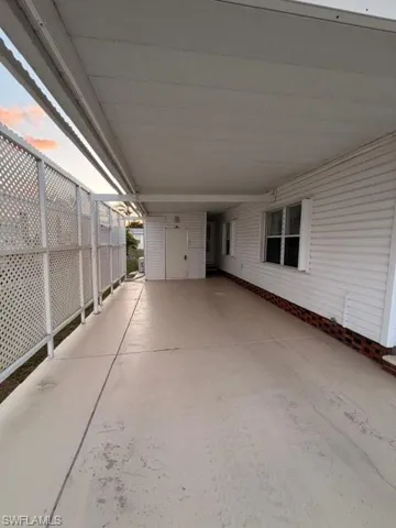 View of patio / terrace with an attached carport