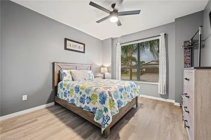 Neutral tone wall finish with wood-finish flooring