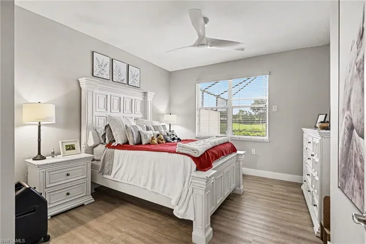 Neutral gray walls complementing wood-finish flooring