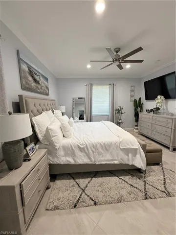 Bedroom featuring crown molding, ceiling fan, and recessed lighting