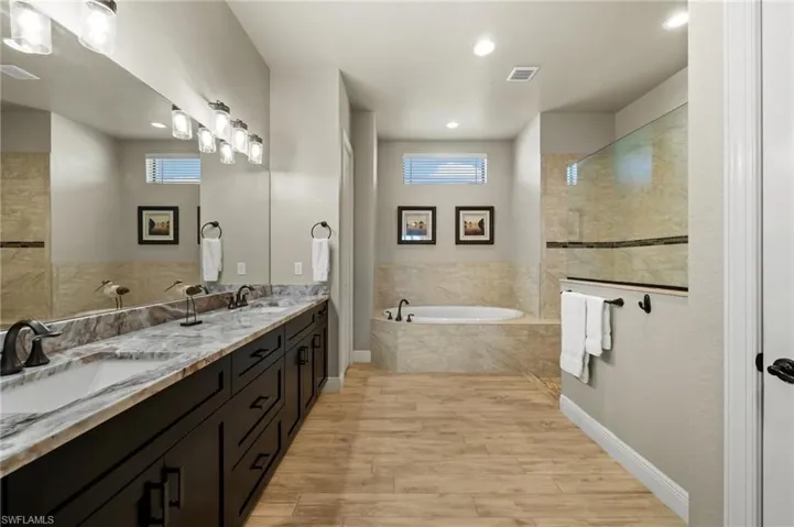 Master Bath with separate tiled tub and shower