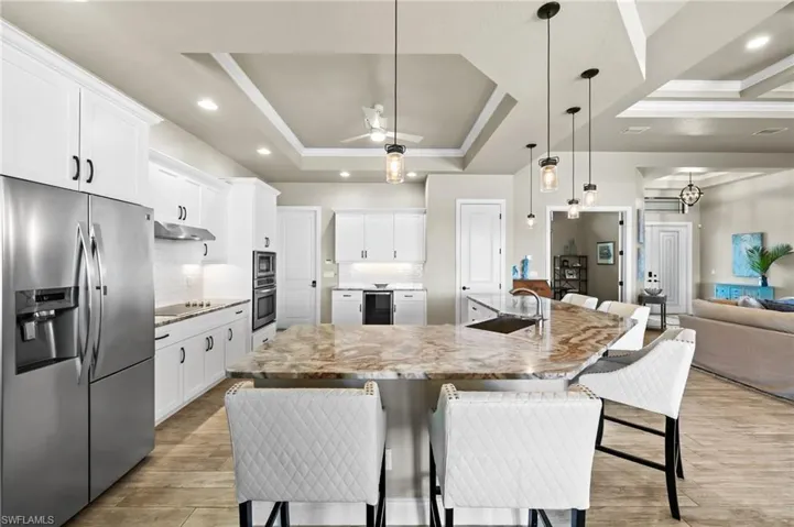Granite tops in the spacious kitchen
