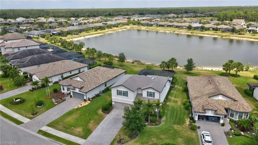Bird's eye view with a water view and a residential view