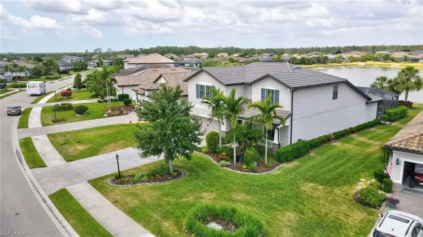 Aerial view with a water view and a residential view