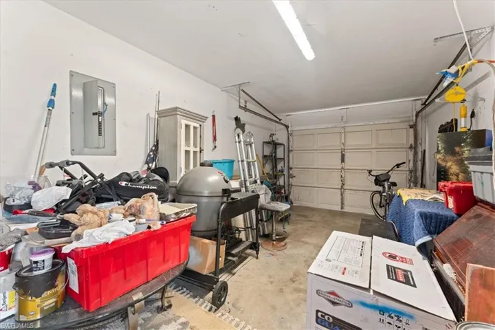 Garage featuring electric panel