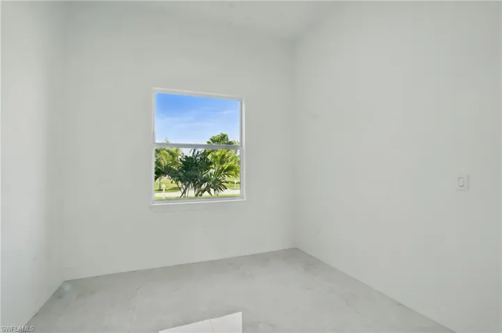 Spare room with baseboards
