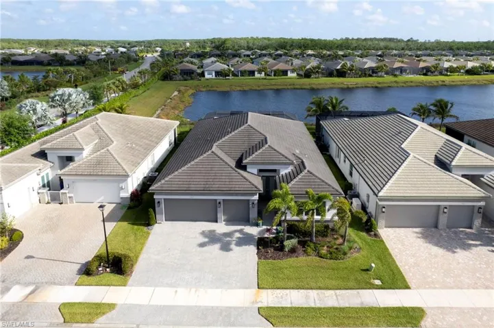 Drone / aerial view featuring a residential view and a water view