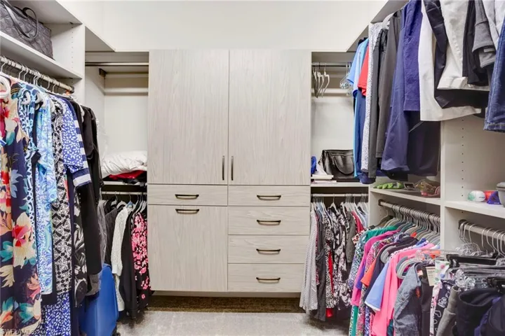 Spacious closet featuring carpet floors