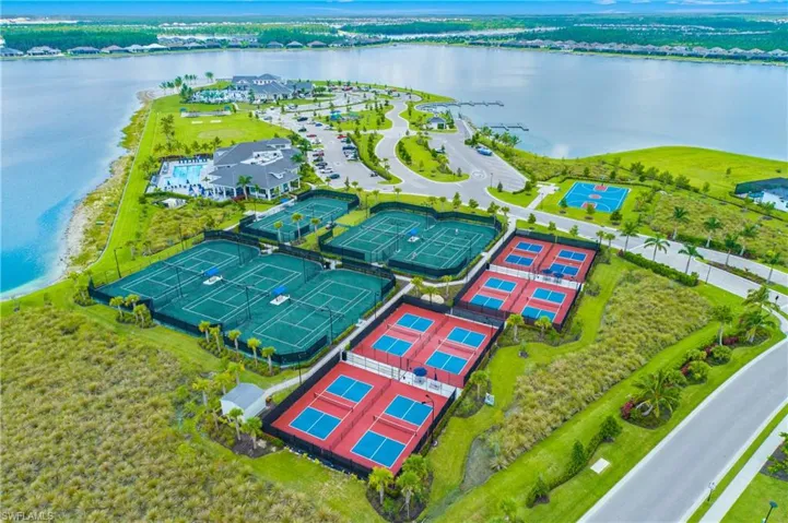 Sports CLub with 8 pickleball courts, 6 tennis courts, full court basketball, bocce, fitness center, yoga and spin rooms, lap pool and his/hers sauna.