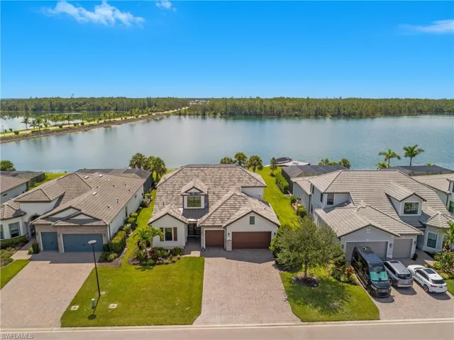 Welcome to 19013 Aqua Shore Dr with over 75' of stunning lakefront and protected preserve views! Located on an oversized lot near the end of a cul-de-sac, with no homes on the opposite side of the street.