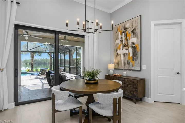 Kitchen cafe area is the perfect place to enjoy your morning coffee while taking in the views of the lake beyond.