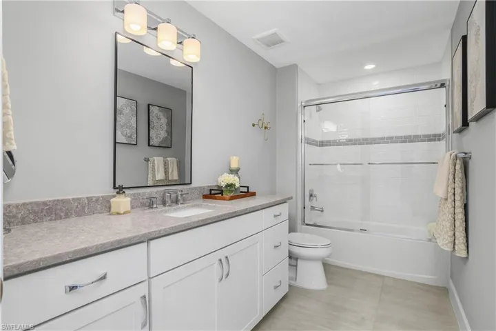 Upper level bath in loft area.