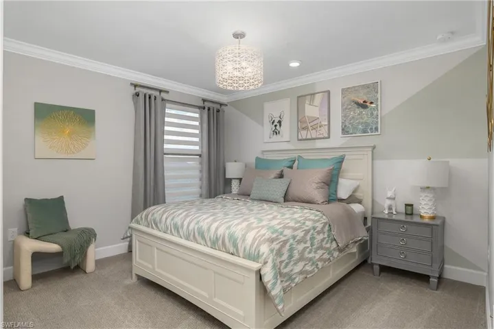 Upper level Guest Bedroom located in loft area includes ensuite bath for guests.