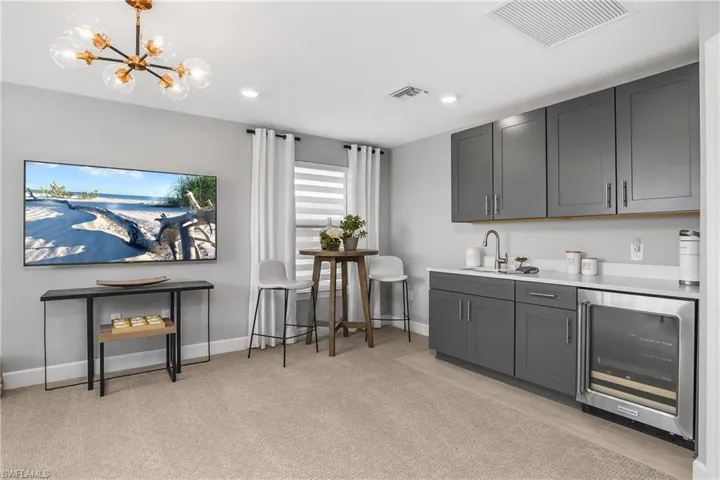 Loft is great for entertaining or relaxing and includes a beverage service area with beverage cooler and sink.