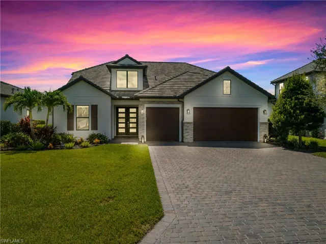 Home has lots of added features: whole home generator, remote storm shades, custom wood detail throughout, InReach storage system in garage, air-conditioned and oversized 3-car garage, recently painted exterior with NEW front door and NEW garage doors, and so much more!!
