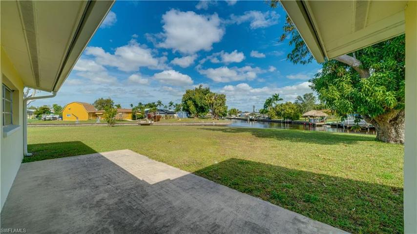 A room with a view? Sliders lead from the great room to the back yard patio. Perhaps brick pavers, a room addition, or the lanai for your "to be built" pool? A wonderful canvas; a wonderful opportunity.