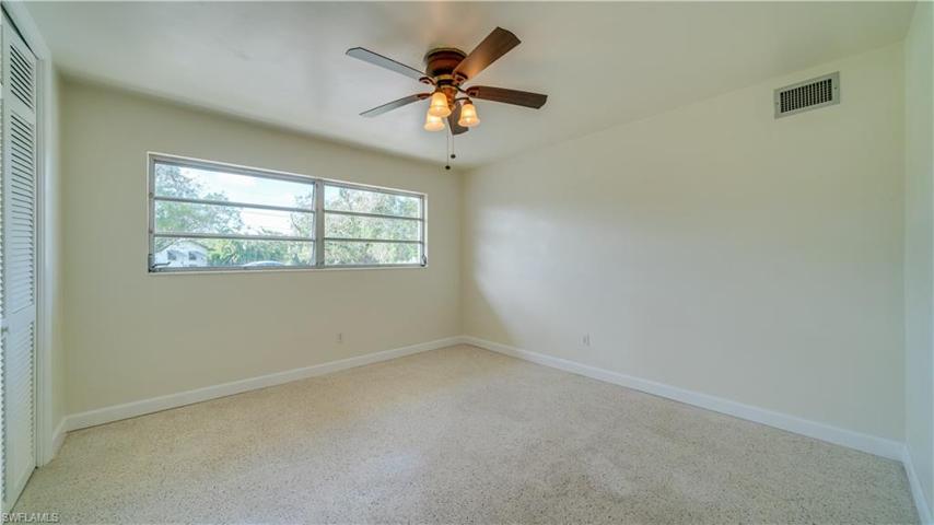Bedroom No. 2 is "just down the hall"; steps away from the great room area.
