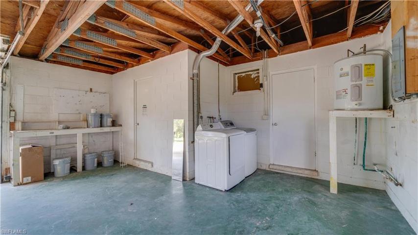 If you're in need of a 2-car garage, a work-shop area, and room for storage; you've found it!