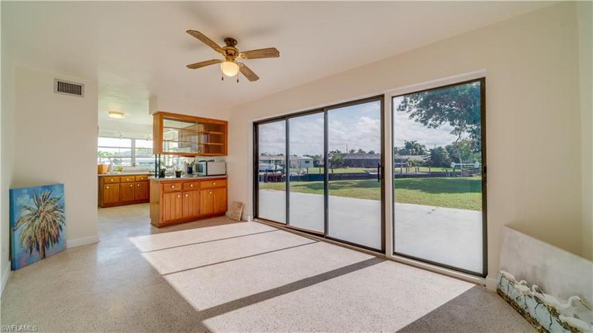 Prior to Hurricane Ian, the screened lanai enhanced this lovely property. Perhaps a Florida room, a screened lanai...you decide.