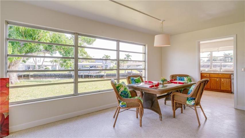 The dining area is perfectly positioned just steps from the dining area. This home's footprint offers great flow.