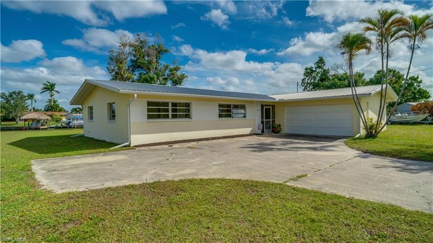 A blank canvas with great bones. This gem can be renovated into a SE Cape Coral showplace. Terrazzo flooring, plaster walls, 3 bedrooms, 3 bathrooms and a lot offering endless possibilities!