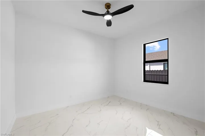 Unfurnished room with ceiling fan