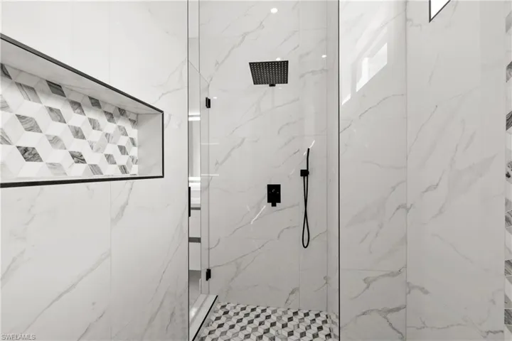 Bathroom featuring an enclosed shower