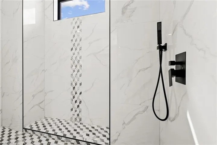 Details with a tile shower