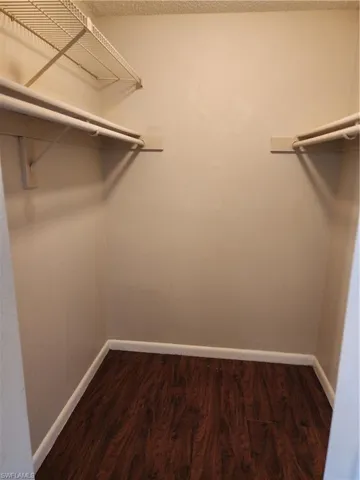 A plentiful walk-in closet featured in the primary bedroom