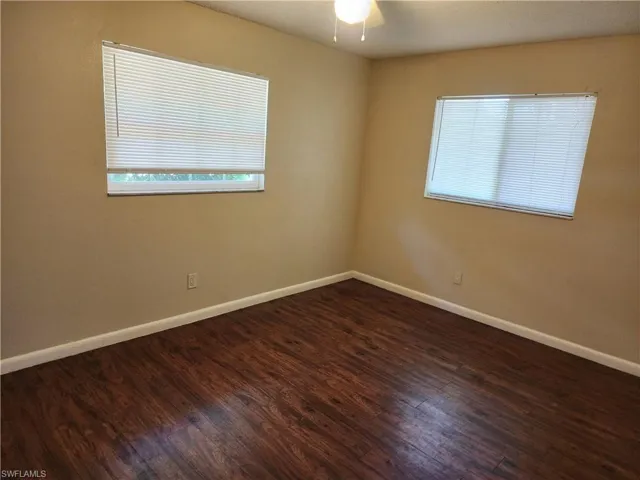 Front Guest Bedroom featuring wood flooring