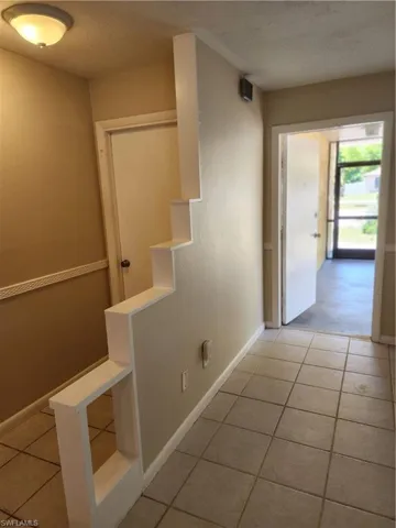 Entry zone Kitchen Island looking towards front entry door and garage entry door