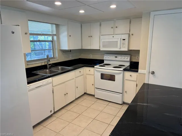 Nice view of the pool and lanai from the kitchen window. All appliances included