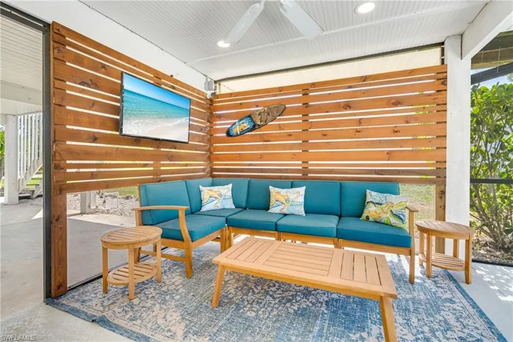View of patio / terrace with a ceiling fan and outdoor lounge area