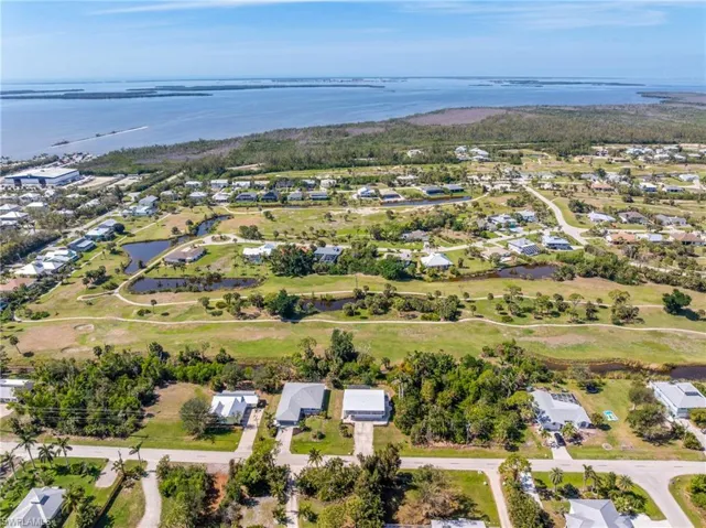 Aerial view with a residential view and a water view