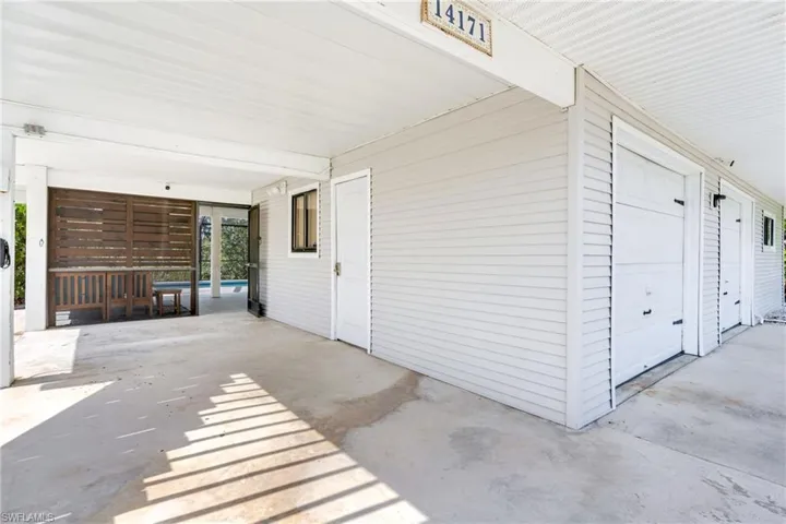 View of patio featuring a garage