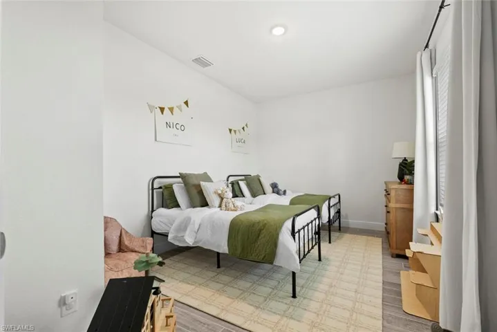 Bedroom with light wood-type flooring