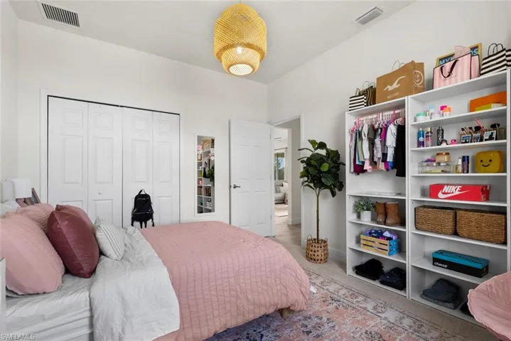 Bedroom featuring a closet