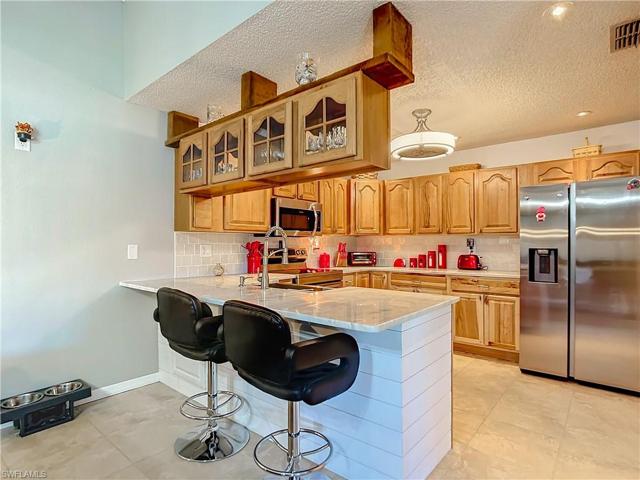 Breakfast bar for a place to eat in the kitchen