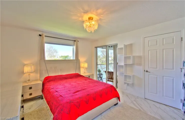 Bedroom featuring access to exterior