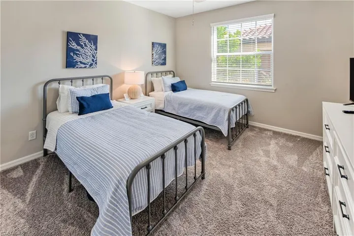 Bedroom featuring carpet