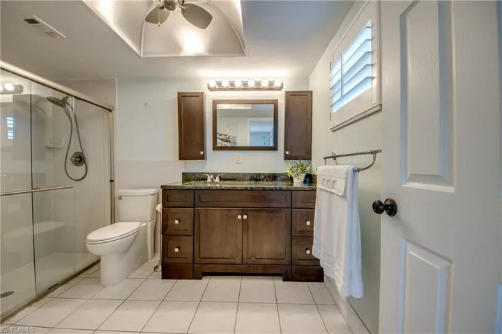 Primary ensuite bathroom. Both bathrooms have windows since this is an end unit.