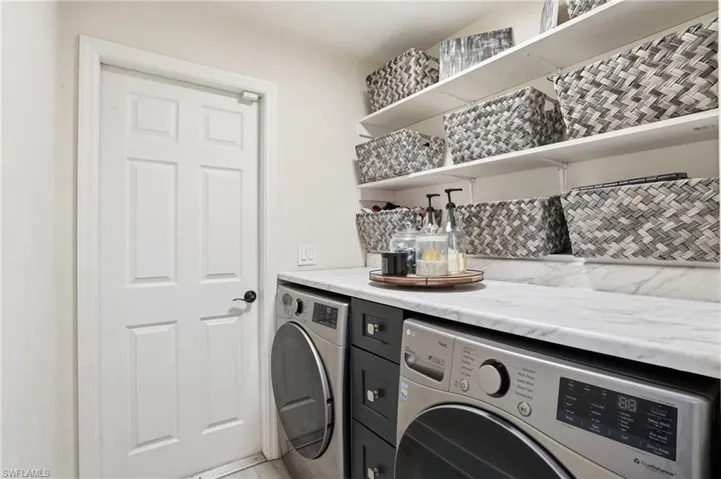 Laundry area featuring washing machine and dryer