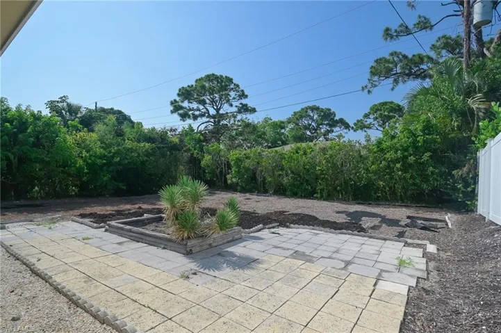 View of back yard- plenty of privacy with landscaping all around the property