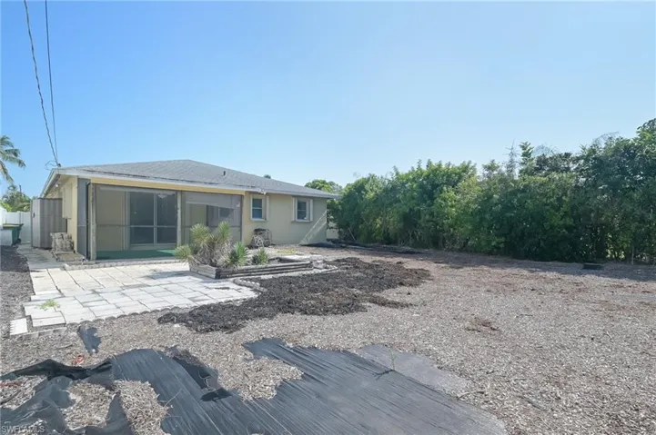 Back of property featuring a patio area